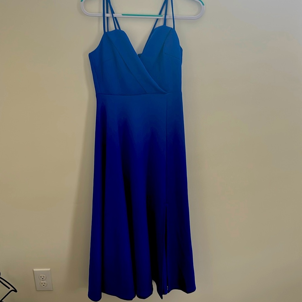 Royal blue ankle length dress with back zipper. Stretch material. Size M